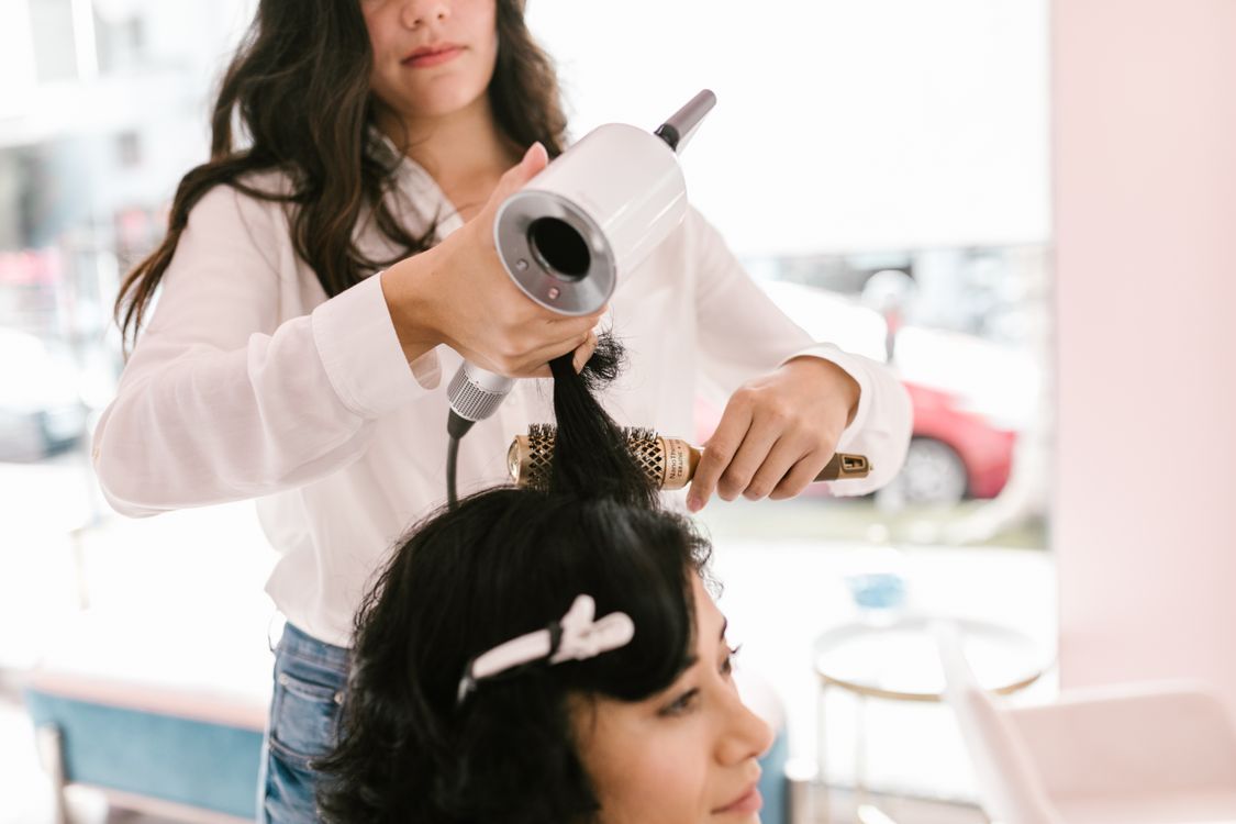 Professional blowout with round brush and dryer