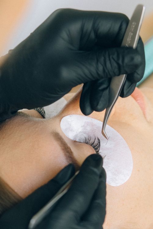 Lash extension application, close-up detail