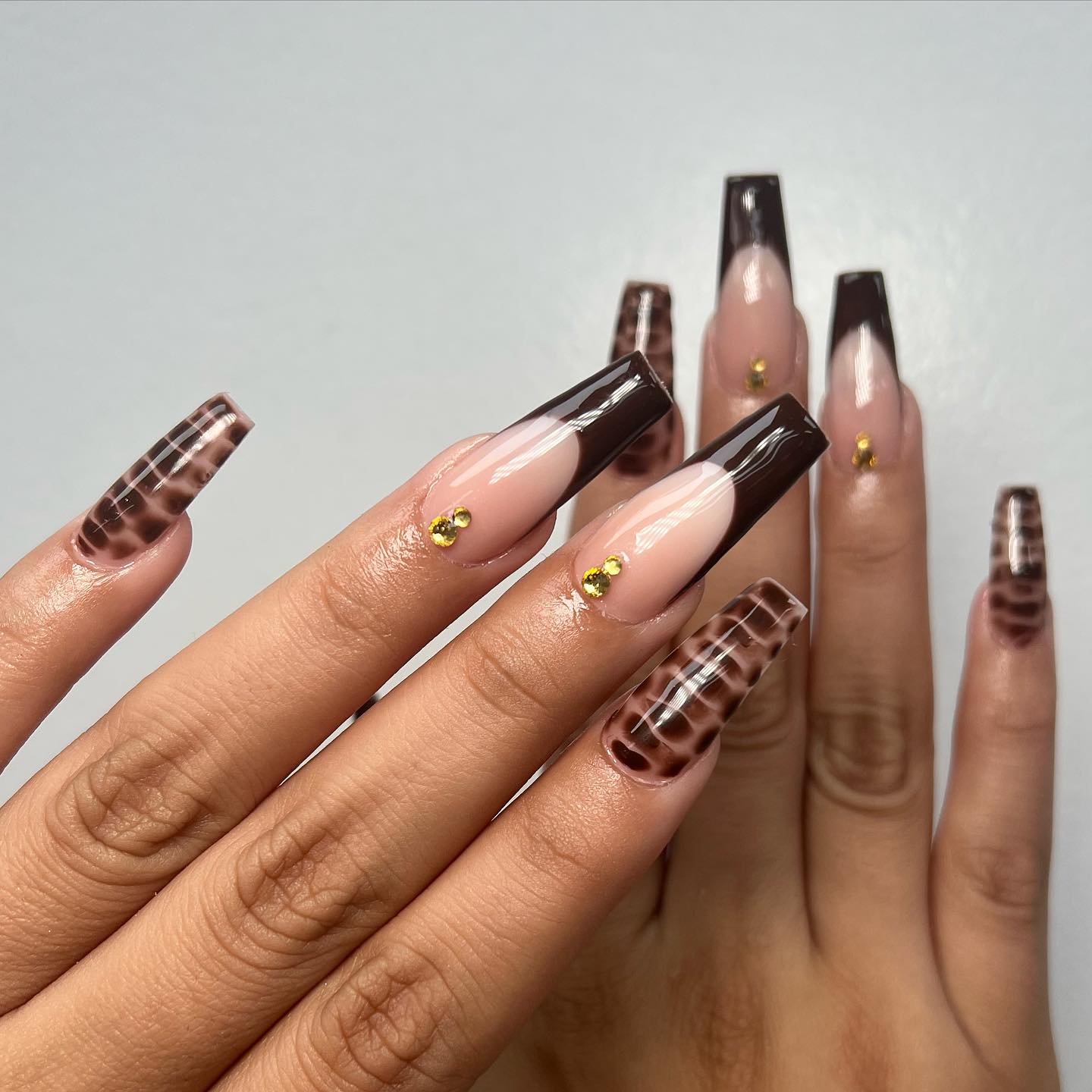 Brown French nails with croc print